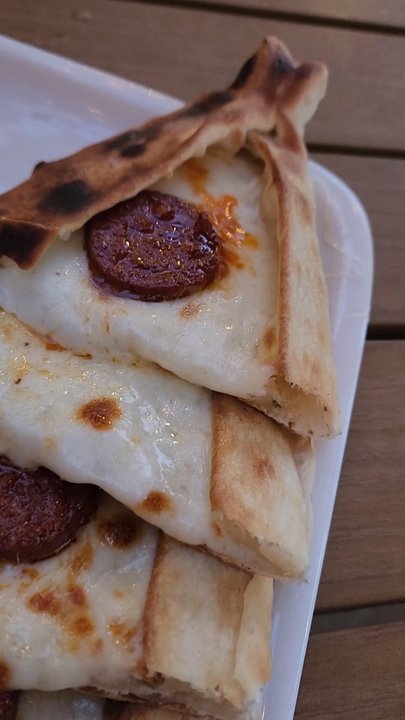 Turkish Village - Spicy beef sausage pide, yummy - Salad Near Me - Dearborn, Michigan