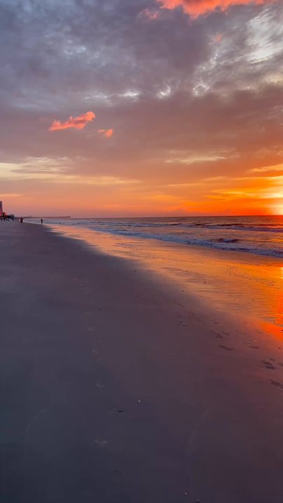 Hampton Inn & Suites Myrtle Beach/Oceanfront - Sunrise on the beach, right outside of the hotel - Hotels Near Me - Myrtle Beach, South Carolina