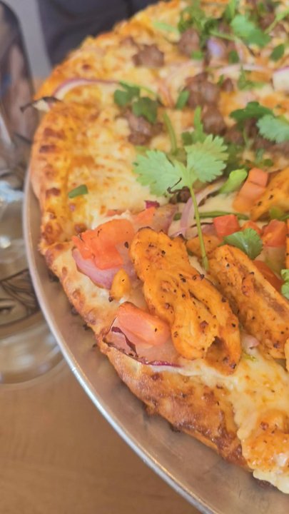 Curry Pizza House Plano - Look at all the toppings!! 1/2 lamb kebab & 1/2 tandoori chicken - Pizza Near Me - Plano, Texas