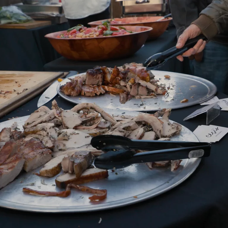 Video of man picking up bbq meats