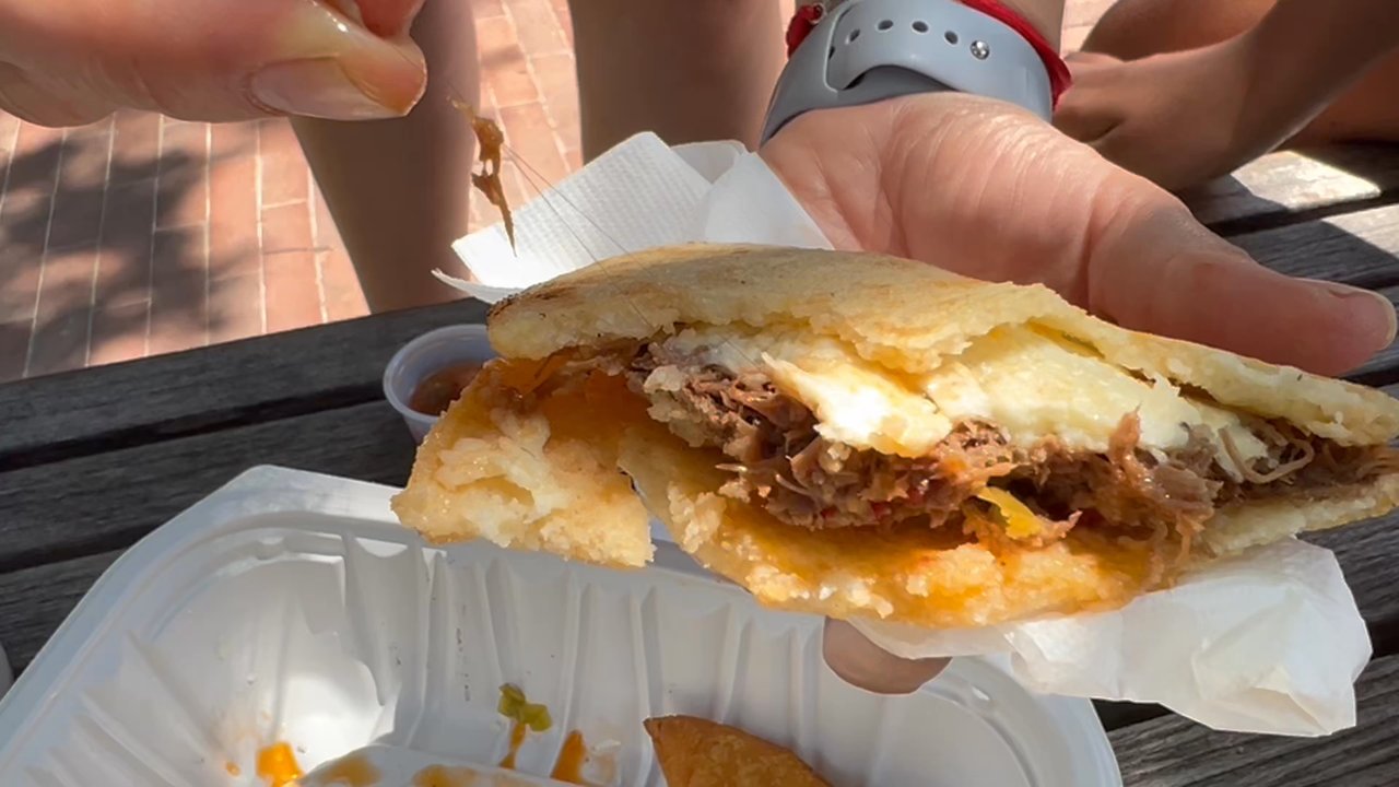 Arepas Pues - Meat arepa with a long hair. Hope hair nets are mandatory after this nonsense! - Venezuelan Near Me - Silver Spring, Maryland