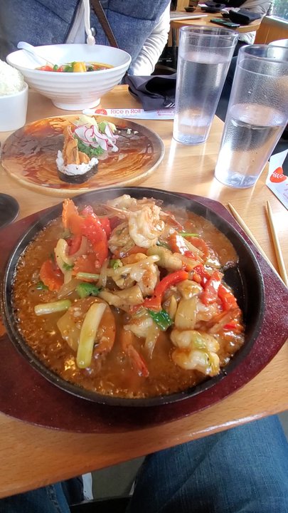 Rice N Roll Bistro - Hot plate Thai peanut sauce plus shrimp! - Sushi Bars Near Me - Milwaukee, Wisconsin