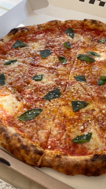 Leo - One bite - Pizza Near Me - Brooklyn, New York