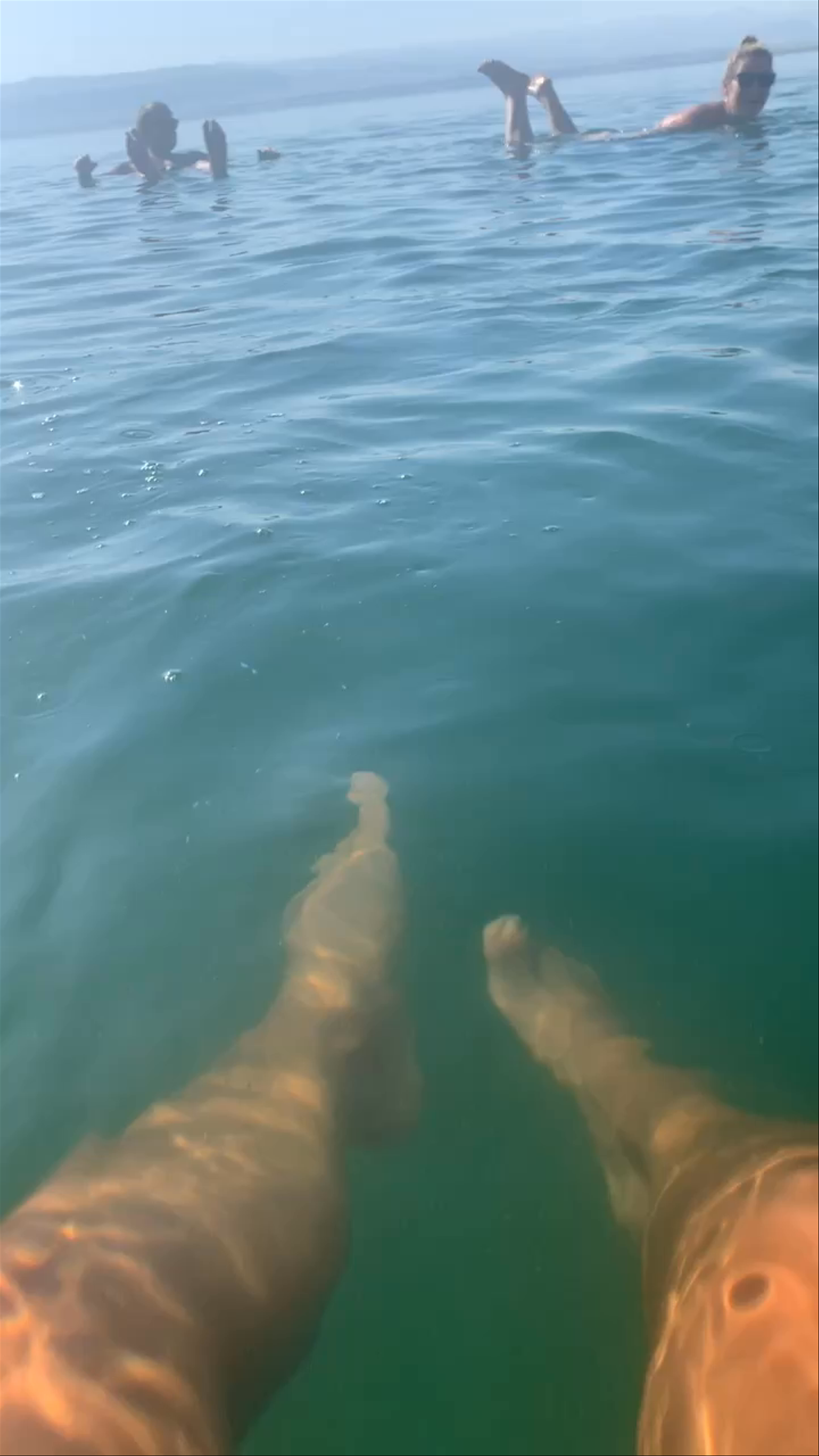 Floating and Relaxing in the Dead Sea, Jordan