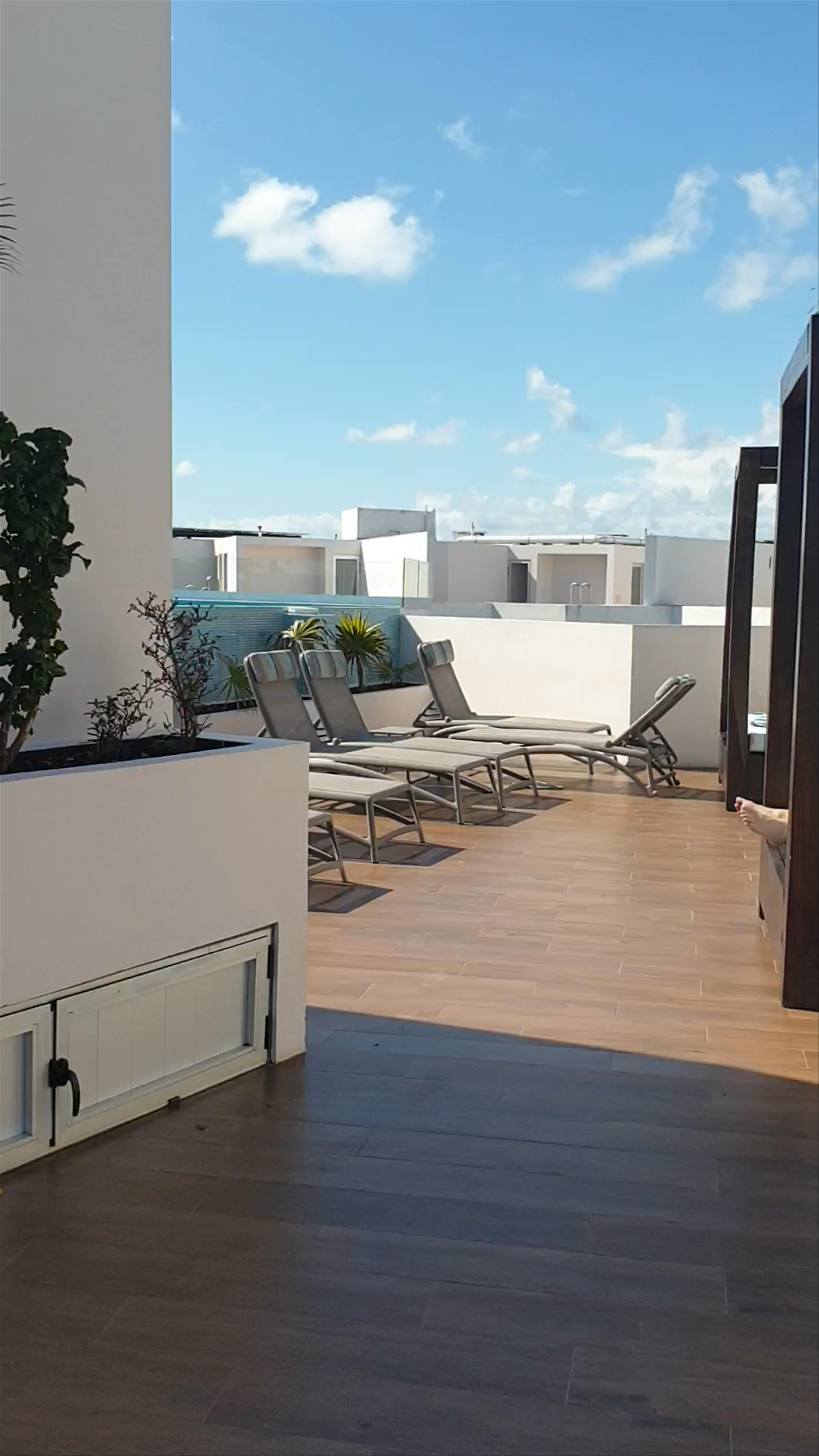 Sunlit Rooftop Pool Oasis at The Gallery Condos, Playa del Carmen