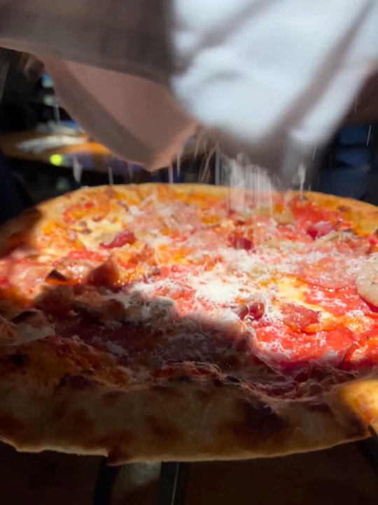 Pie Tap Pizza + Rotisserie + Bar - More freshly grated Parmesan - Pizza Near Me - Dallas, Texas