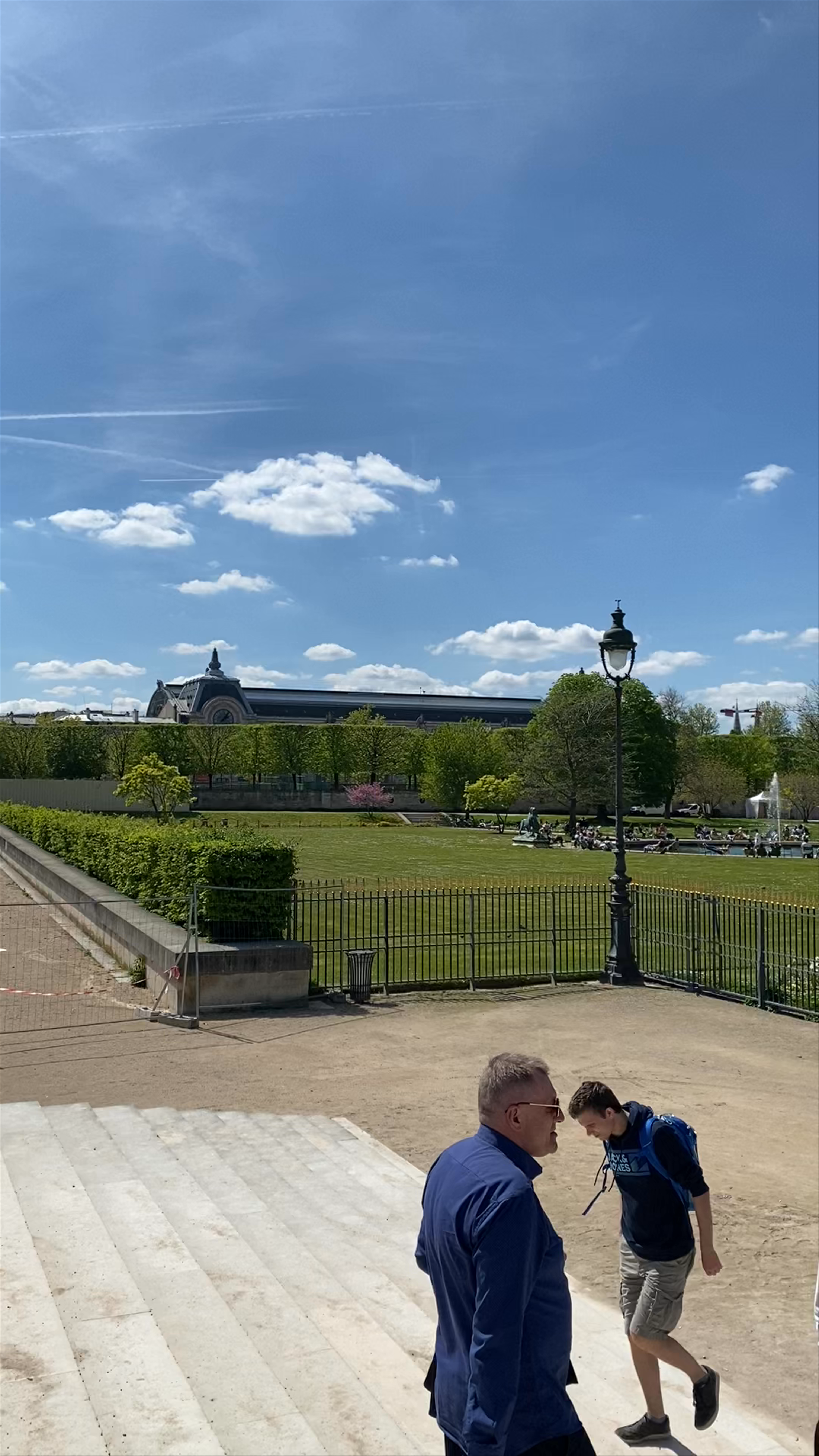 Sunlit Stroll Through Tuileries Garden in Paris