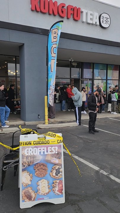 Van Hanh Lion Dance - The  caution tape coming down to give the lions room and the crowd starting to build - Performing Arts Near Me - Albuquerque, New Mexico