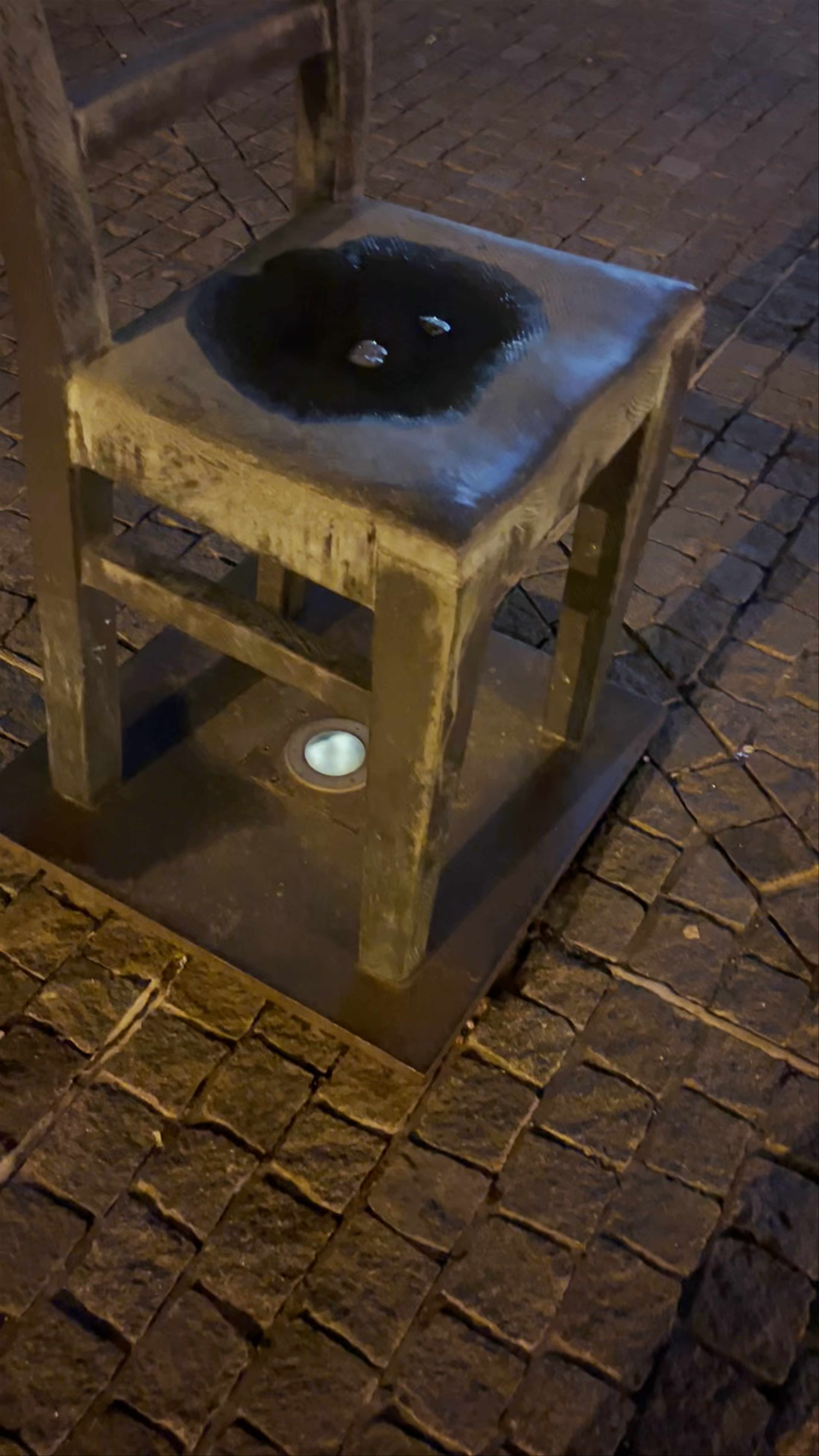 Plaza Héroes del Gueto: Night Reflections in Kraków
