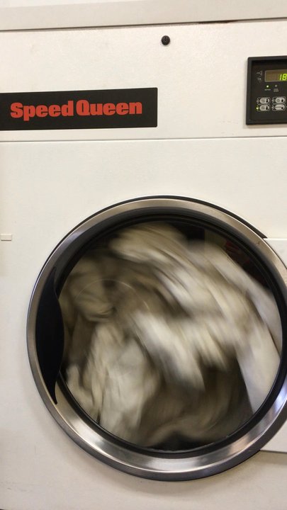 Clean Spot Laundry - The commercial size drier drying my two king size 750 fill down comforters together! You could fit a grown woman in one of these! - Laundromat Near Me - Orem, Utah