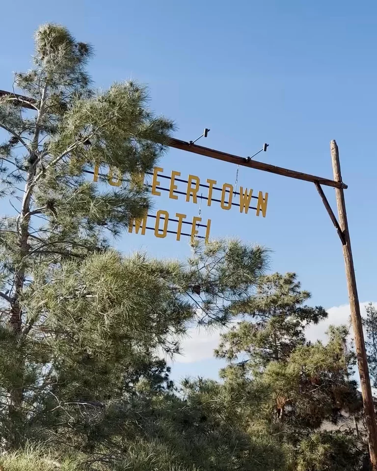 Pioneertown sign blowing in the wind