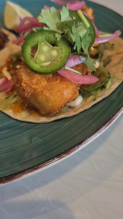 Taco Uprising - See the crisp fish taco batter - Cocktail Bars Near Me - Denver, Colorado