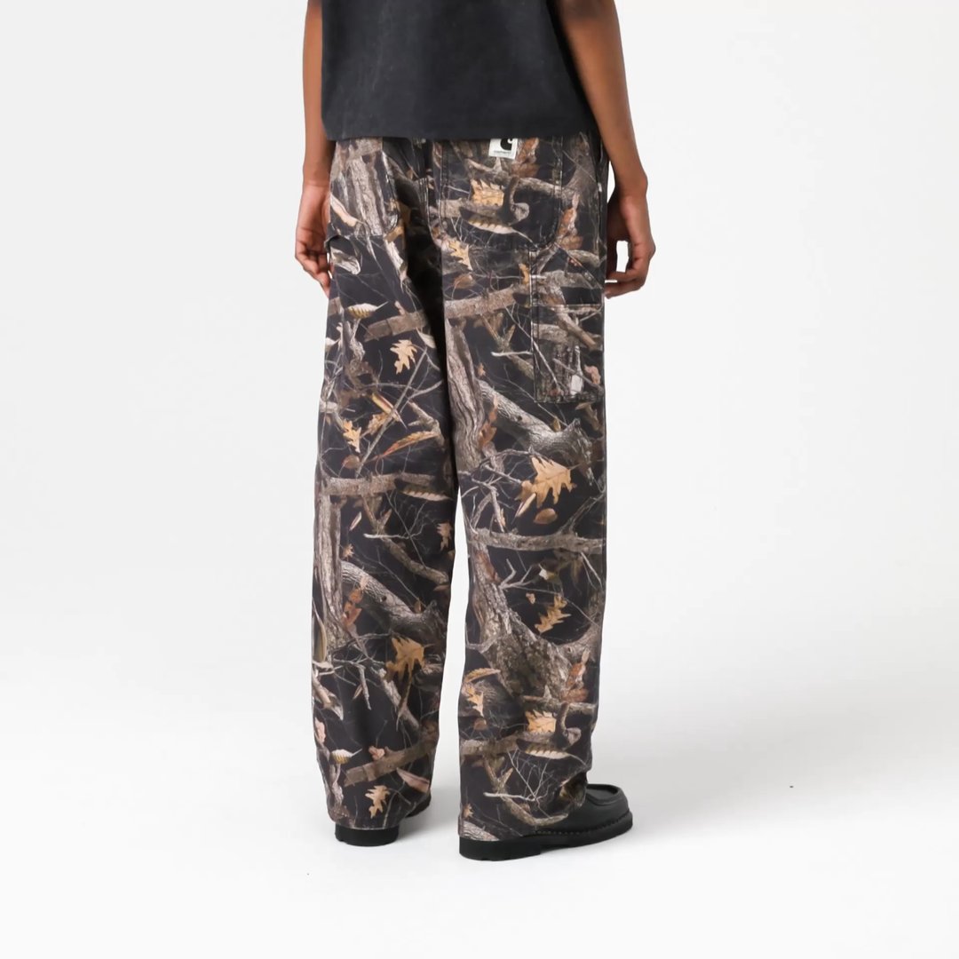 Model wearing a pair of Women's Brandon Single Knee Pants in Camo Feather