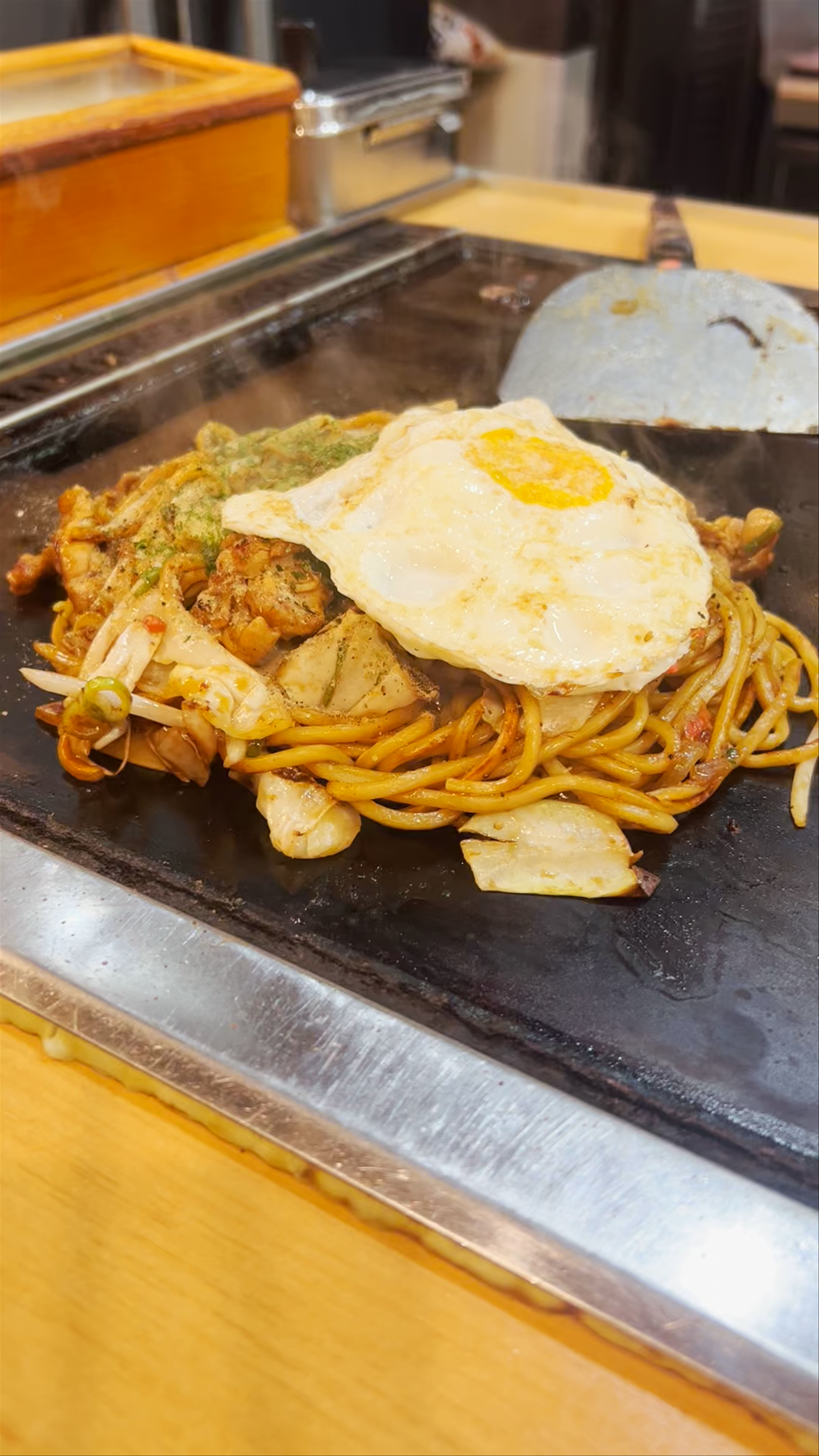 Sizzling Yakisoba with Fried Egg at Doyama, Osaka
