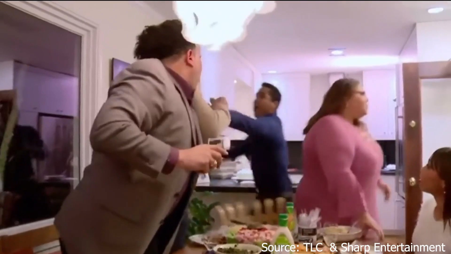 A heated verbal disagreement inside a vehicle escalates into a physical confrontation during a chaotic social gathering in a residence.