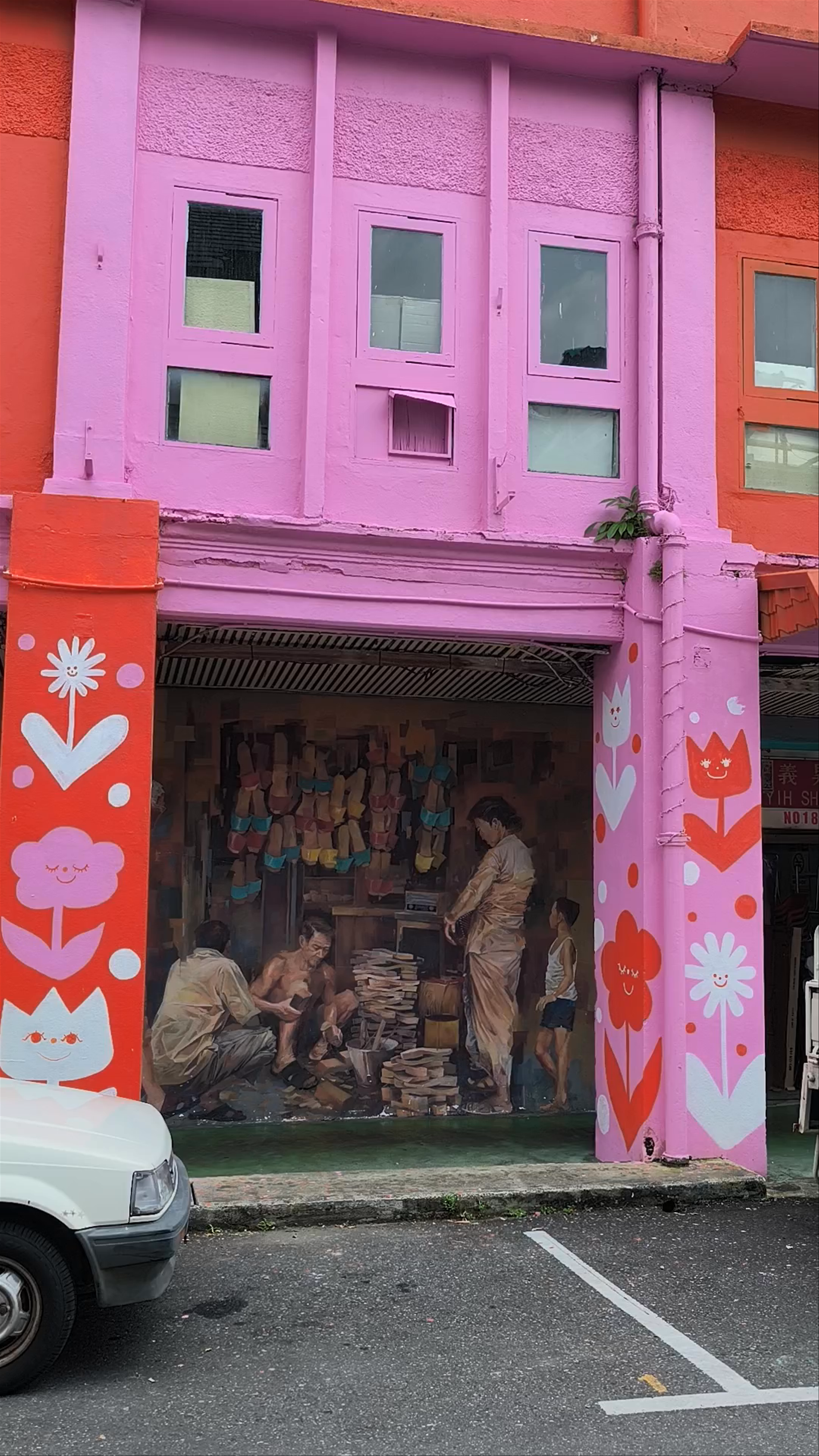Vibrant Street Art and Local Life on Carpenter Street, Kuching