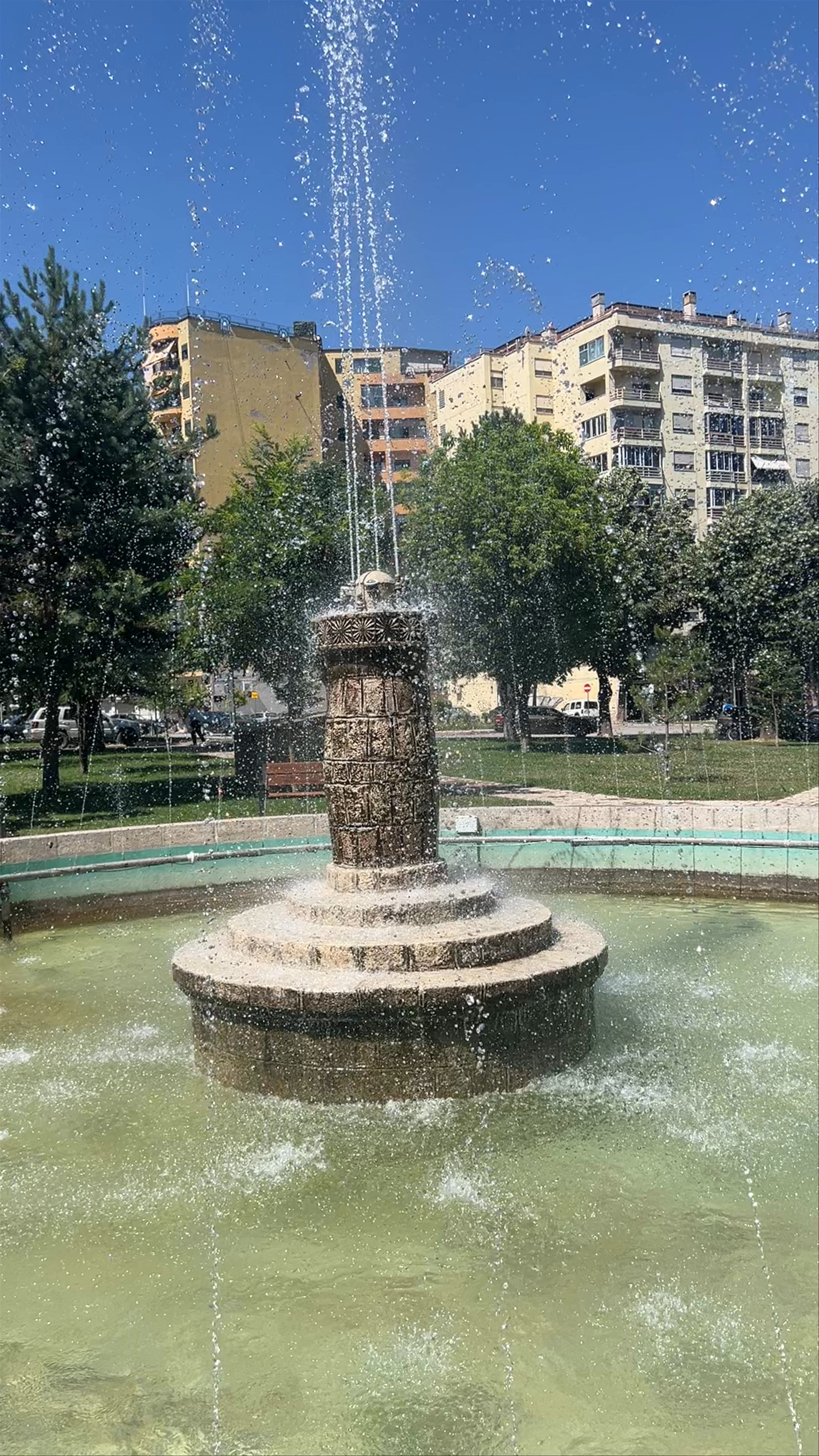 Peaceful Fountain Moments at Parku Vangjush Mio in Korçë, Albania