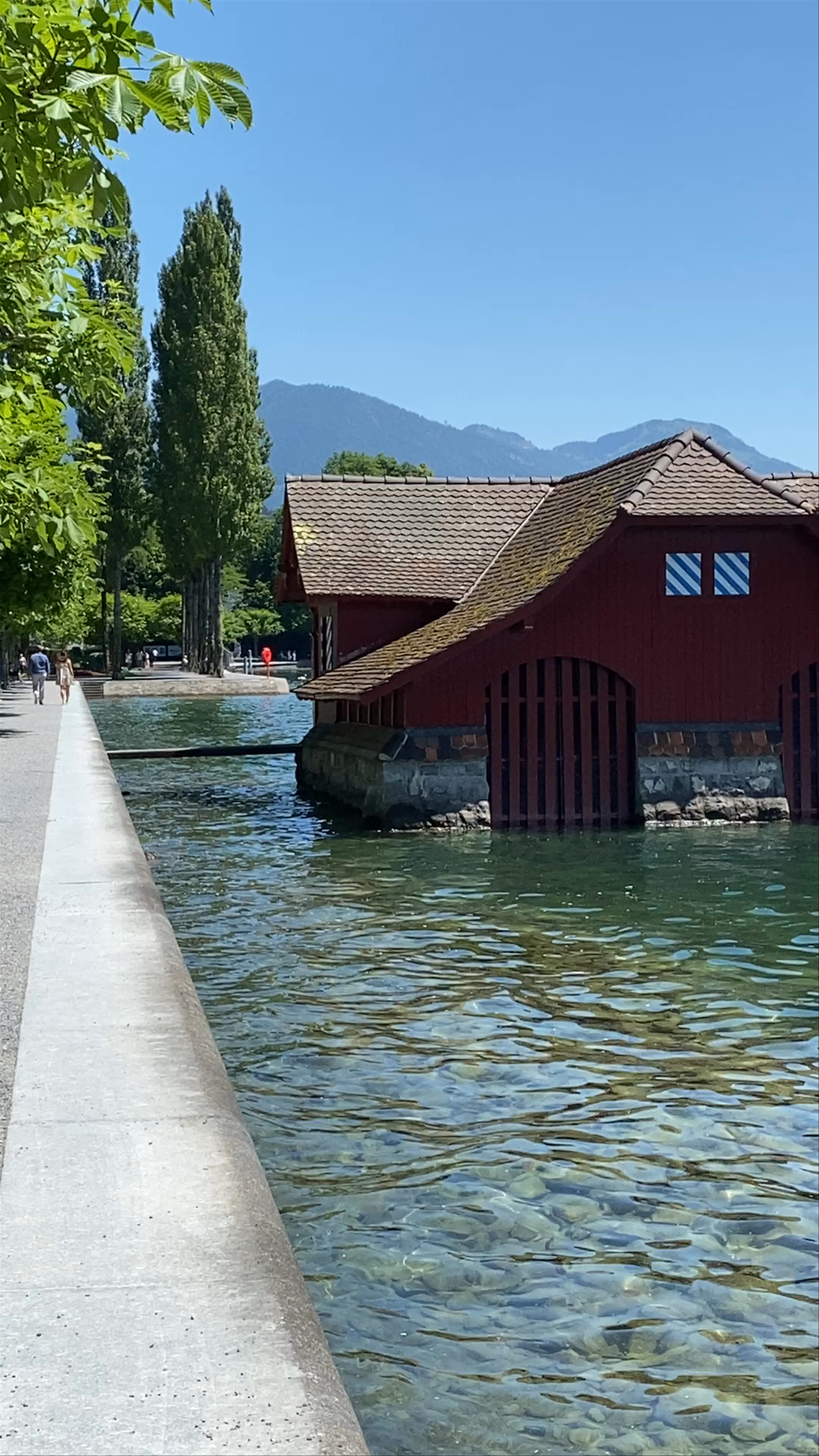 Chapel Bridge and Lake Lucerne Serenity on a Sunny Summer Day