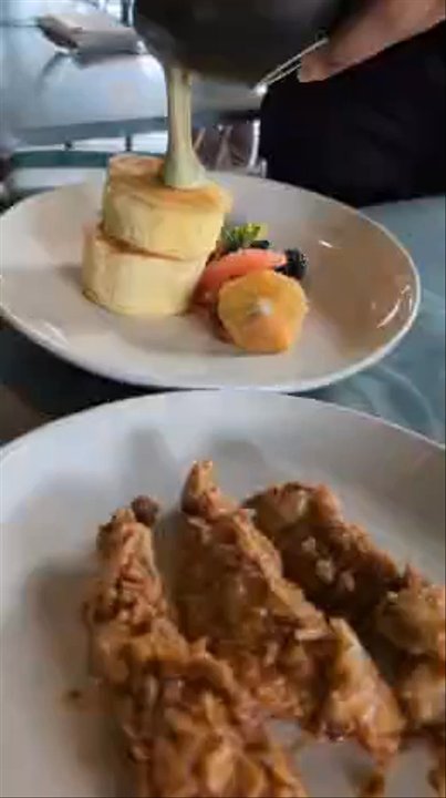 Le PasSage - Japanese pancakes with a side of chicken from the chicken and waffles. - French Near Me - Dallas, Texas