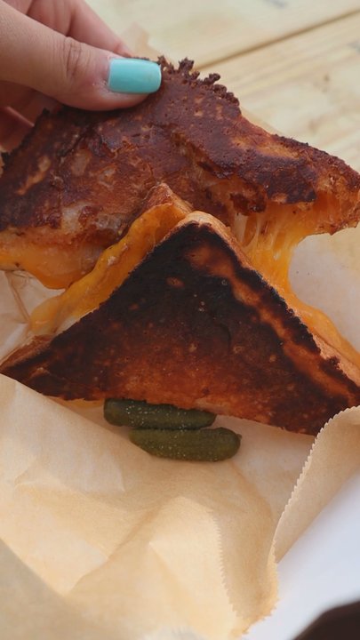 Poor Hendrix - Grilled Cheese w/Tomato Jam on Sourdough cheese pull @tiffhuangry - New American Near Me - Atlanta, Georgia