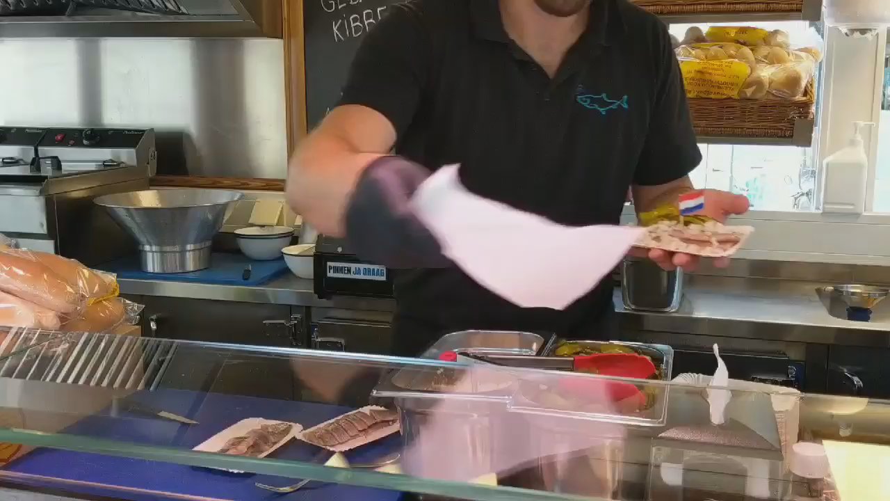 Frens Haringhandel - Making the herring plate - Street Vendors Near Me - Amsterdam, New Hampshire