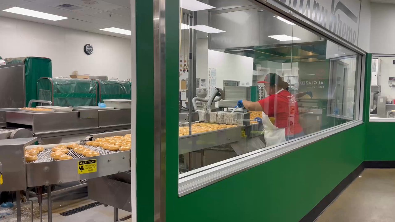 Krispy Kreme - - taken a few months ago, but this is a sneak peak of inside the donut shop! - - Donuts Near Me - Daly City, California
