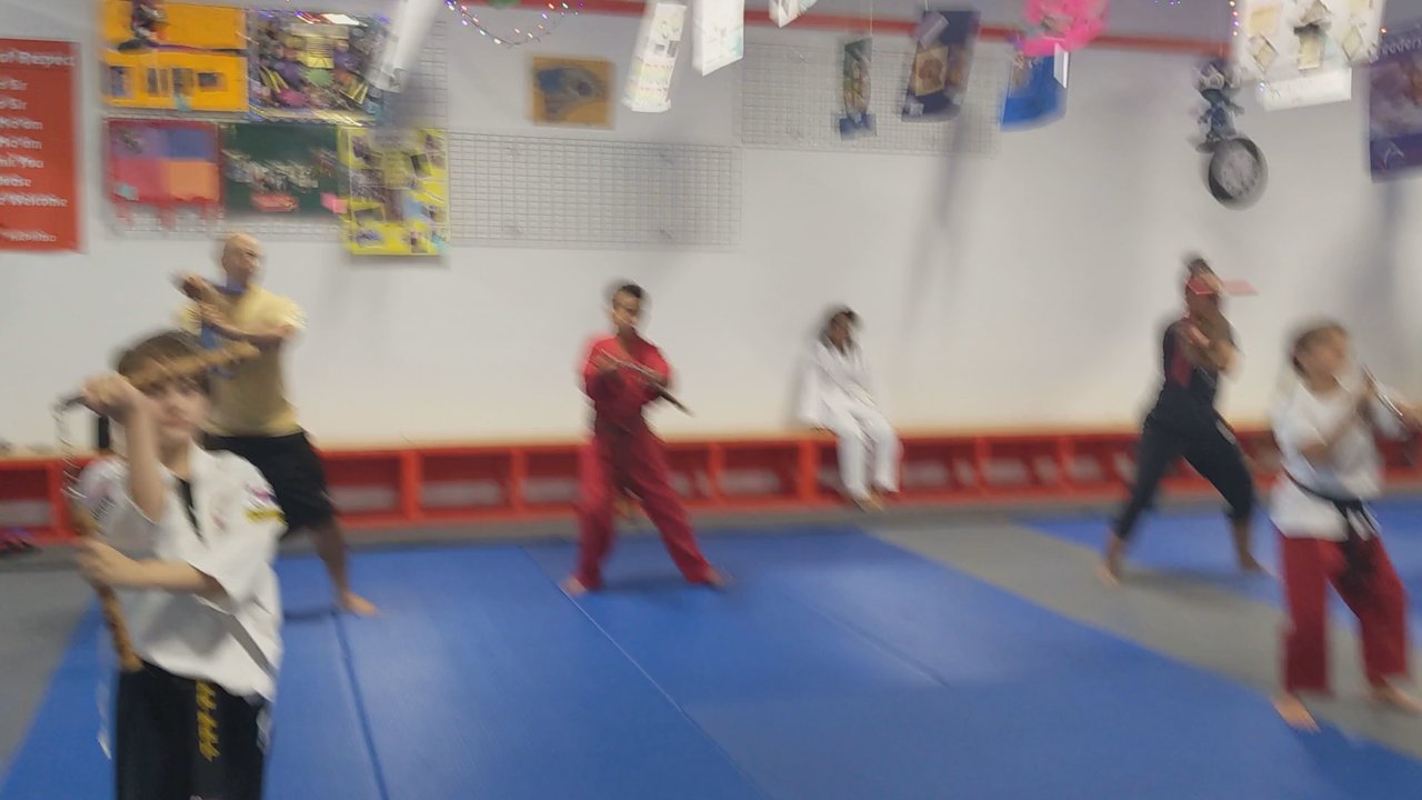 Kim's Hapkido - Parents week. Level 3 students taught parents basic nunchuk form - Self-defense Classes Near Me - Virginia Beach, Virginia