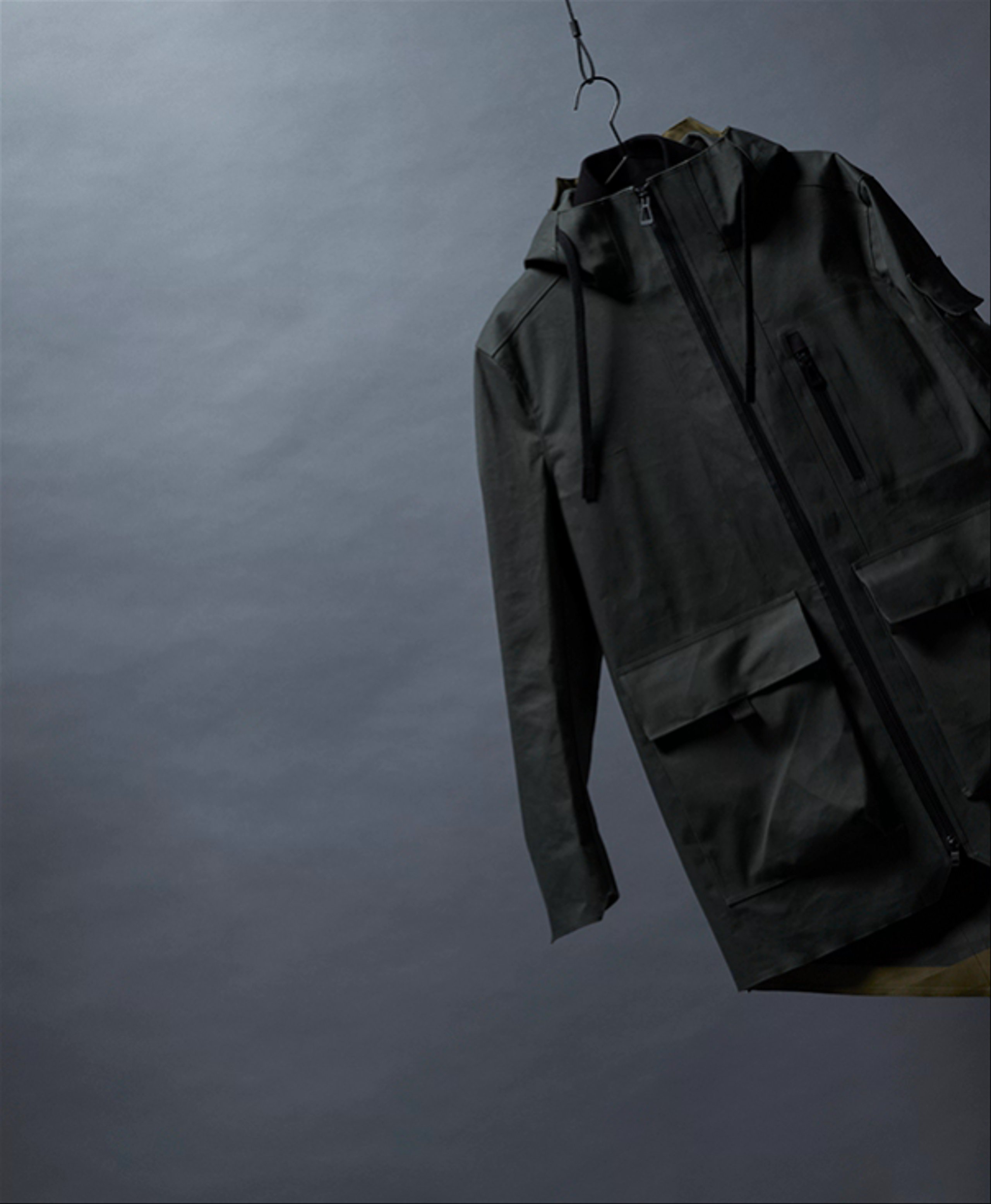 Stop-motion video of AETHER + Mackintosh Field Parka swinging from cord