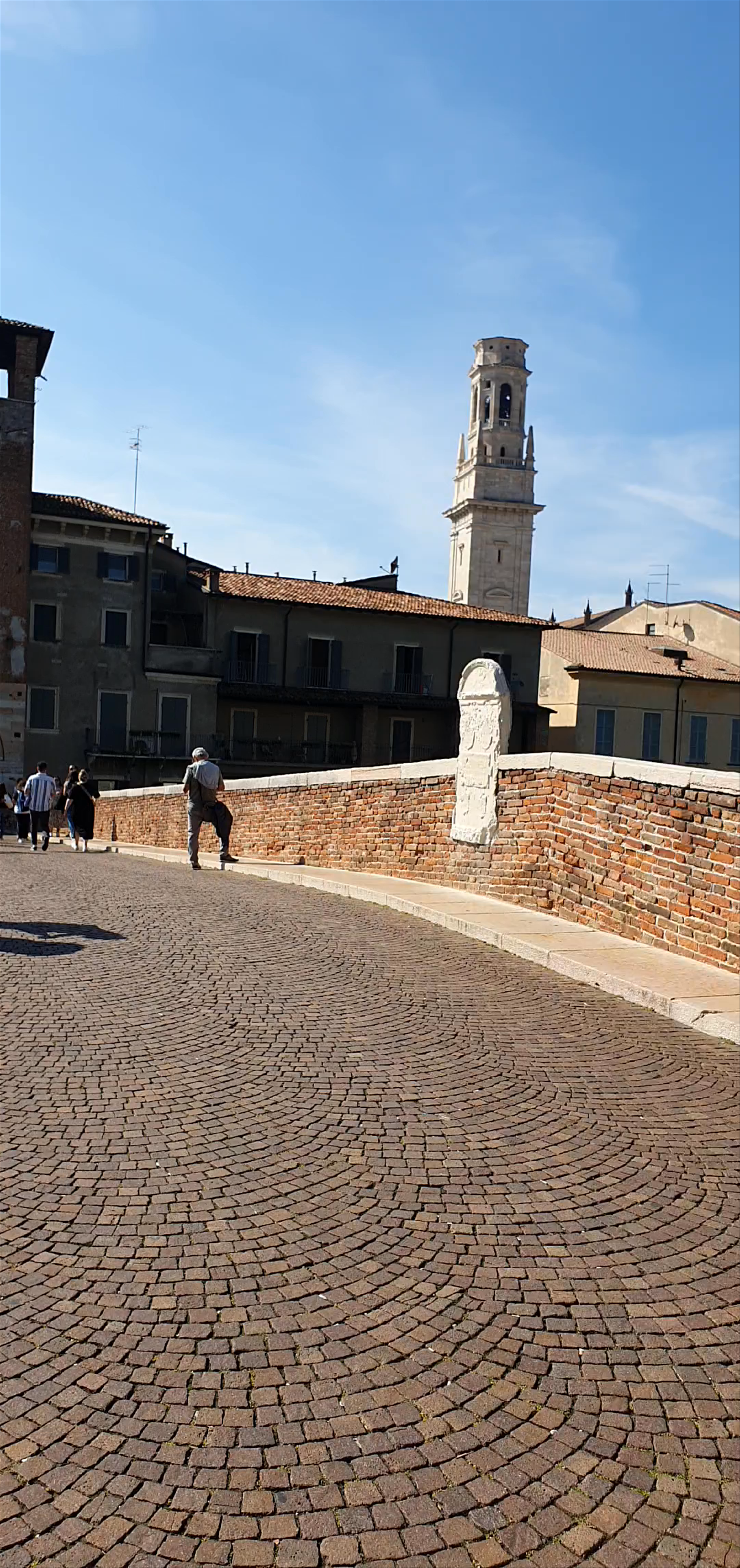 Strolling Along Ponte Pietra in Verona, Italy