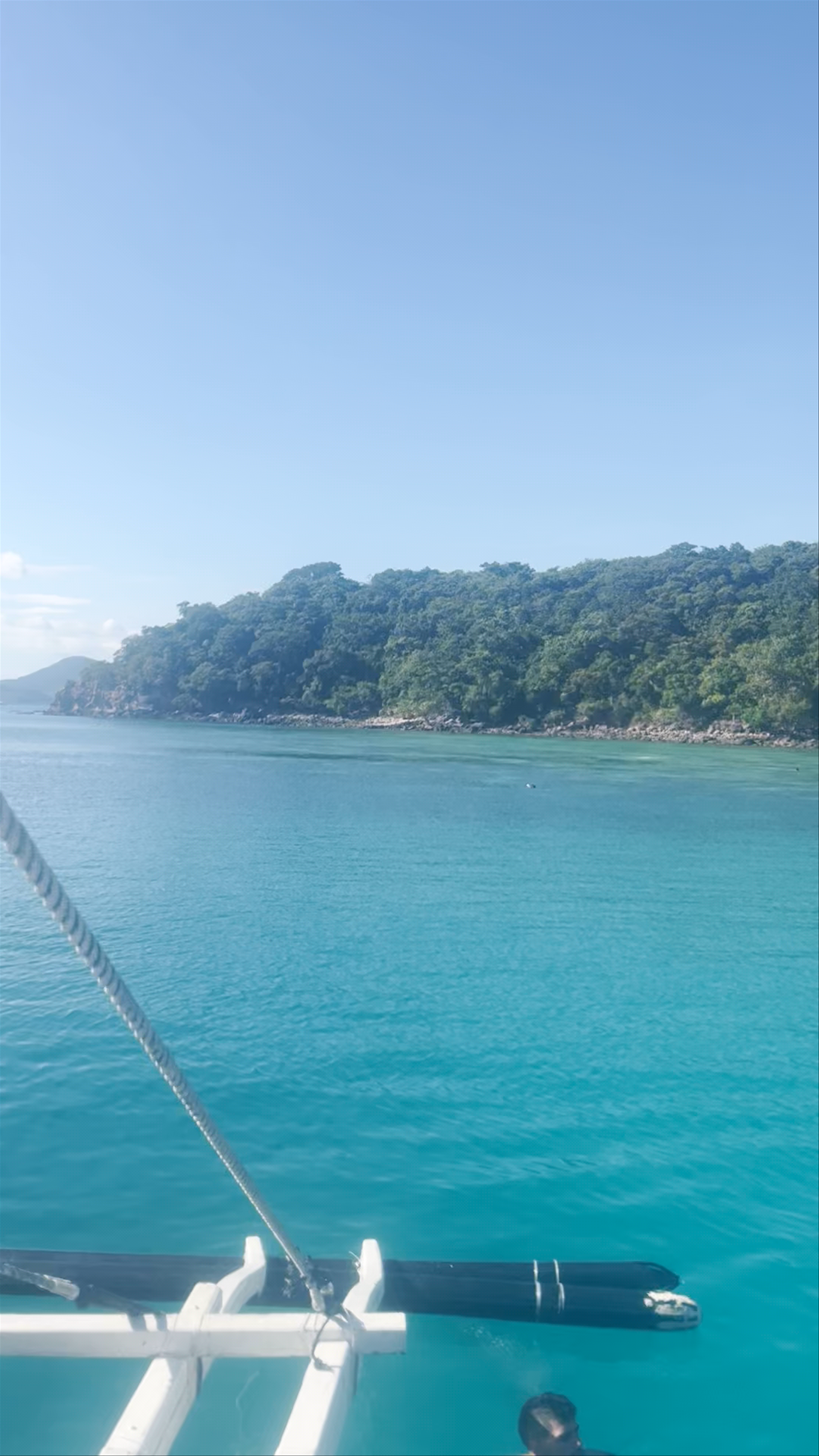 Crystal Clear Waters and Tropical Escape at Ditaytayan Beach, Culion