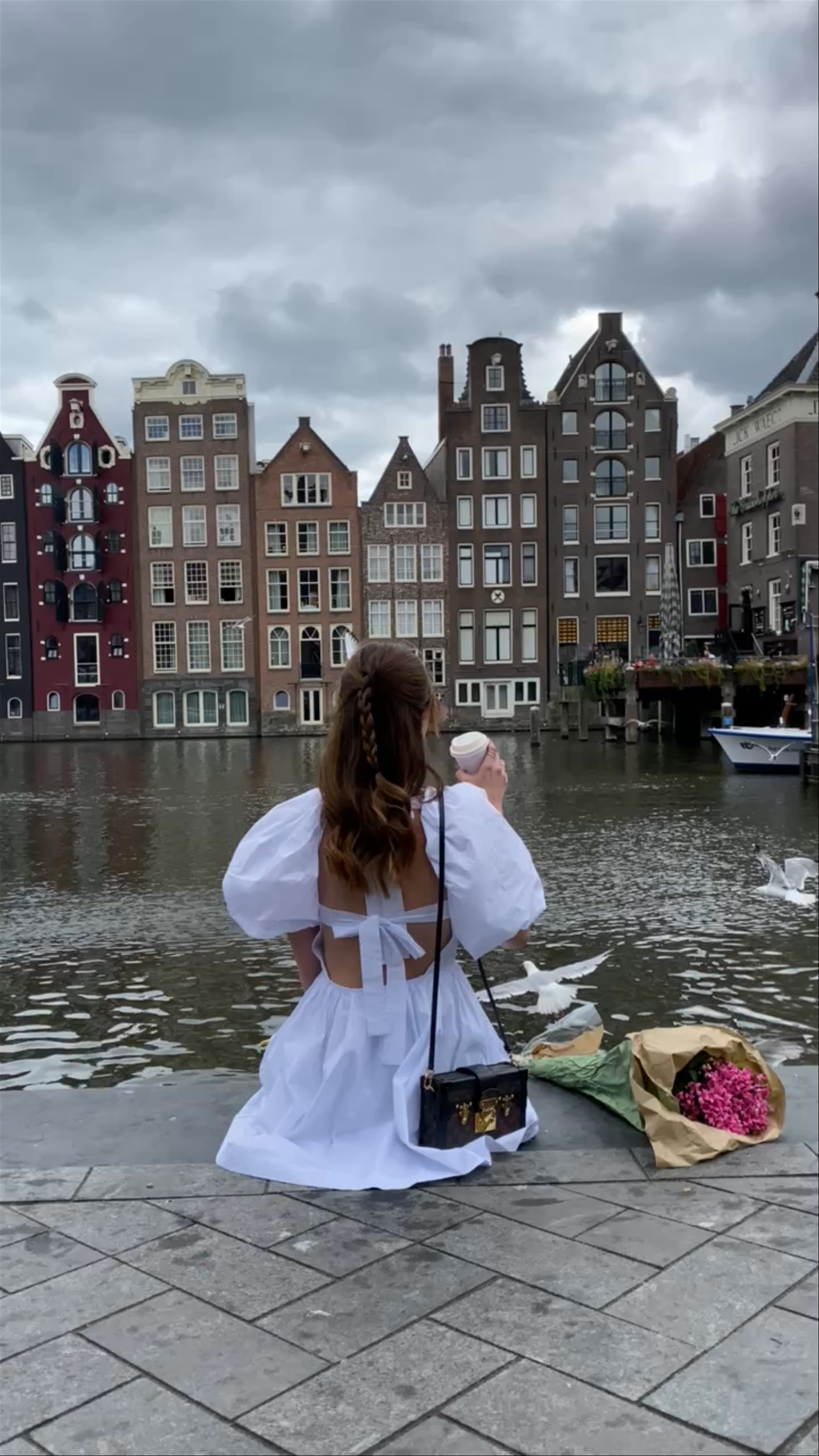 Serene Canal Moments in Amsterdam’s Iconic Waterfront
