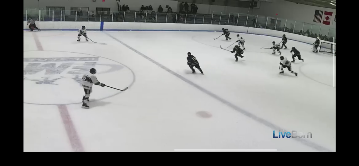 Dominic Fiorentino Delivers a Crushing Open Ice Check!