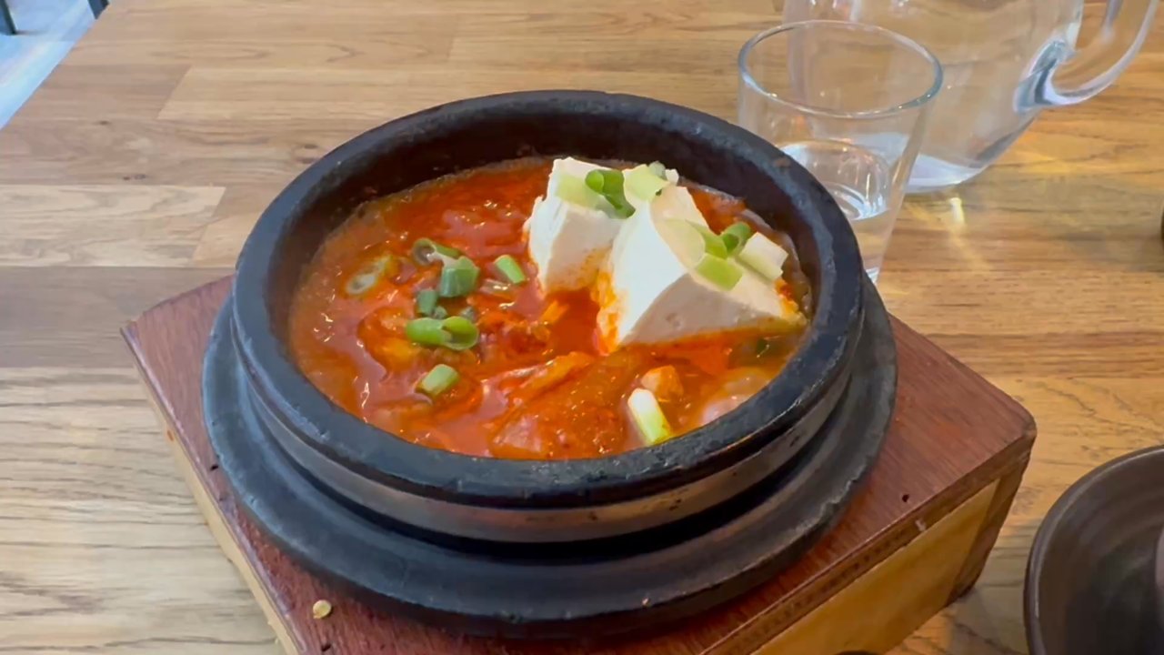 Lime Orange - Kimchi Jiggae in a hot bowl. - Korean Near Me - London, XGL