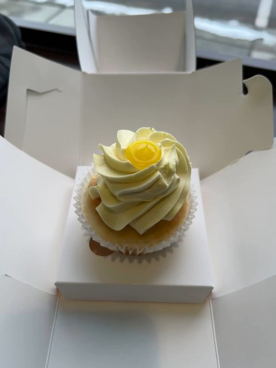 Sweet Treasures Cafe - Wedding Cake cupcake with European style lemon frosting and lemon filling. - Custom Cakes Near Me - Apple Valley, Minnesota