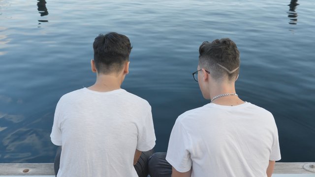 Gay couple near the lake