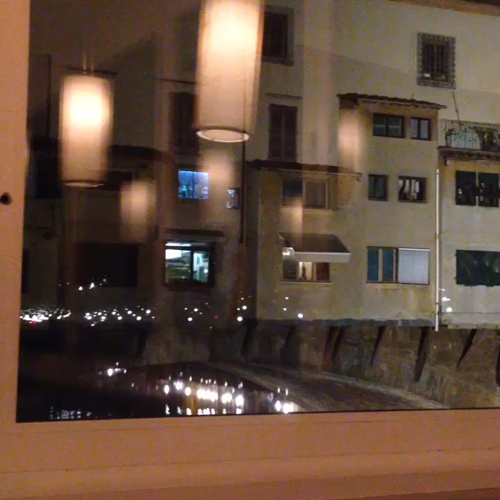 Golden View Open Bar - Soothing out the window at Ponte Vecchio. - Italian Near Me - Florence, FI