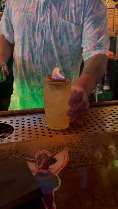Tiki House - The zombie was such a fun drink because it was set on fire. The cinnamon cut the sweetness in the best way and made the rum drink delicious - Tiki Bars Near Me - Key West, Florida