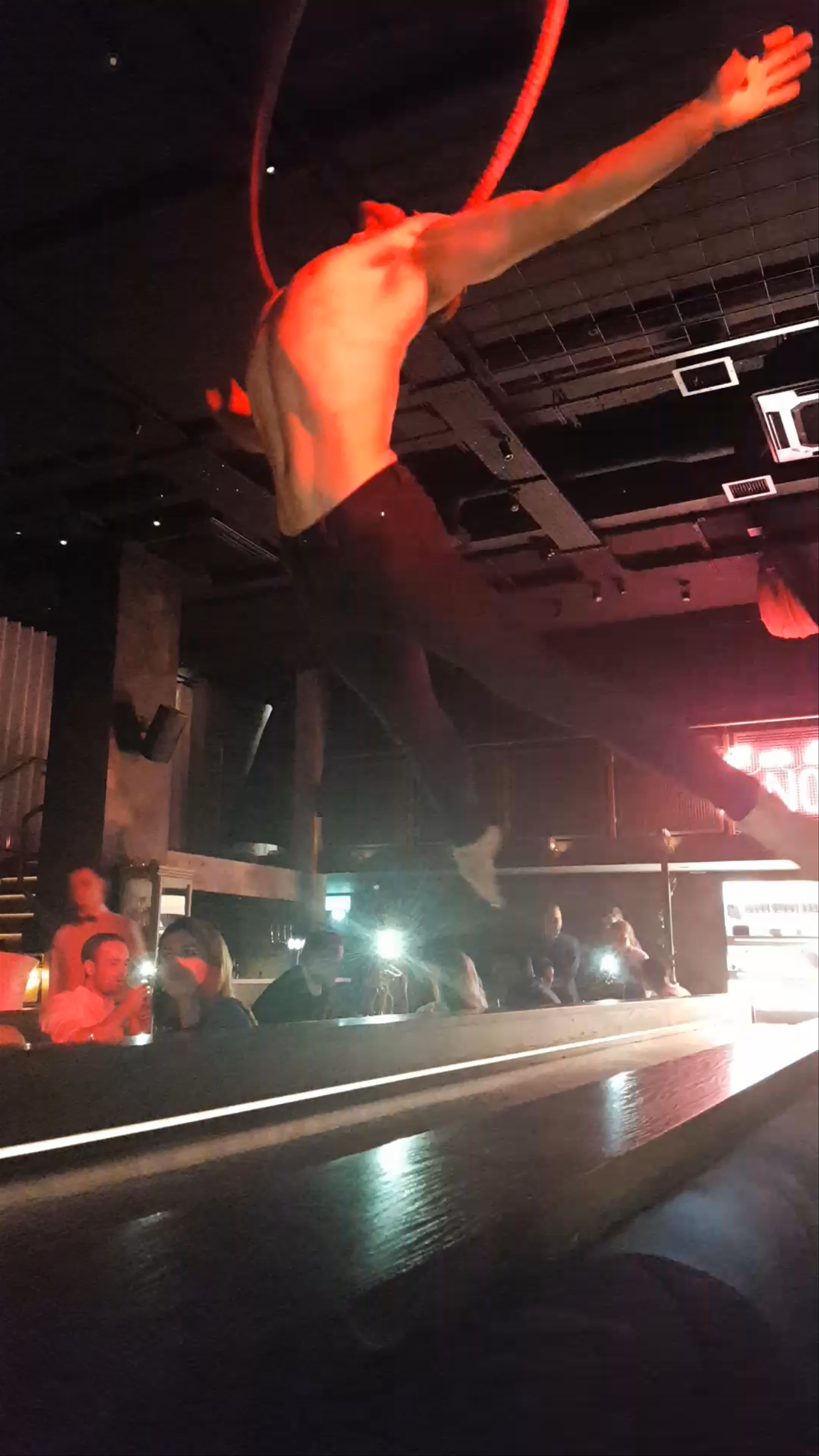 Electrifying Aerial Hoop Performance at Menagerie Bar, Manchester