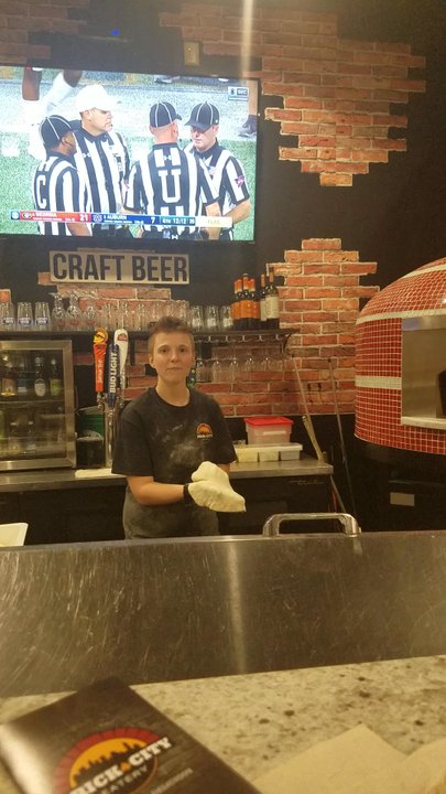 Brick City Eatery - Pizza tossing view from the bar! - Pizza Near Me - Lutz, Florida