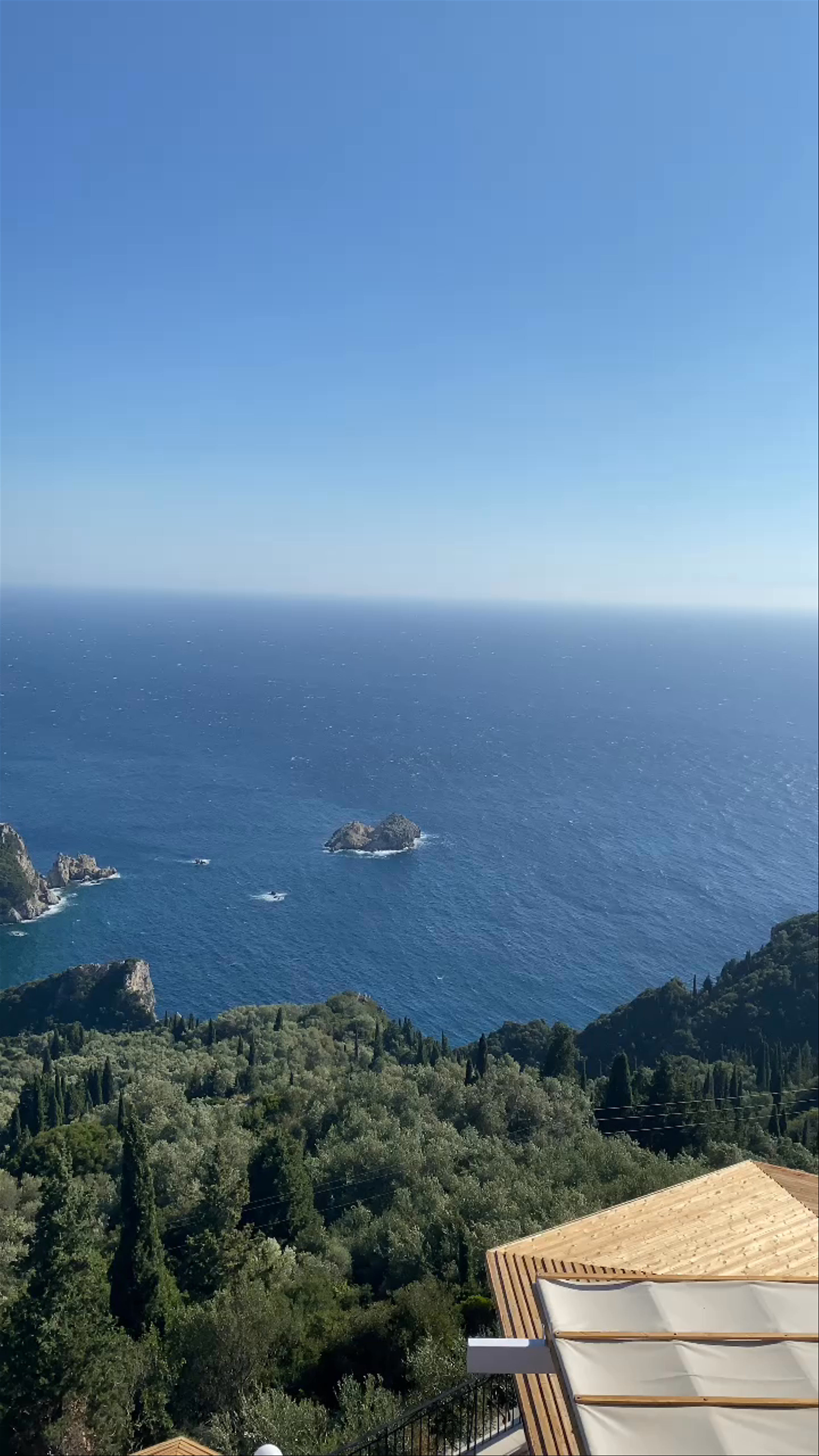 Golden Fox: Panoramic Seaside Serenity in Lakones, Greece