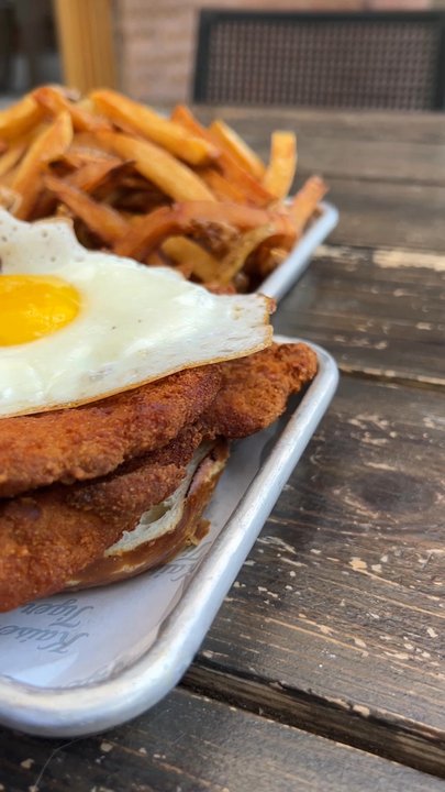 Kaiser Tiger - Schnitzel sandwich with side order of fries - New American Near Me - Chicago, Illinois