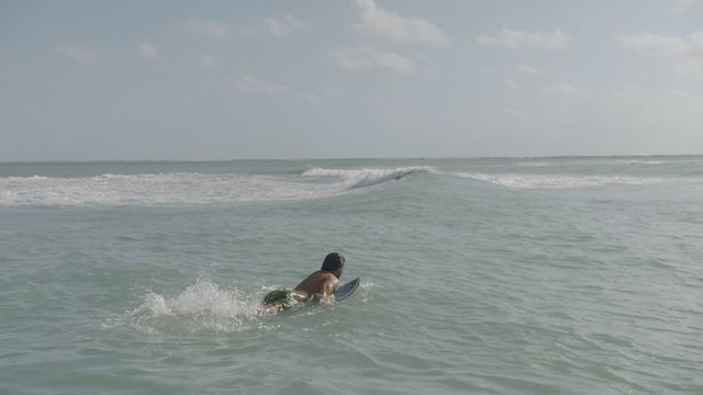 Paddling over the waves