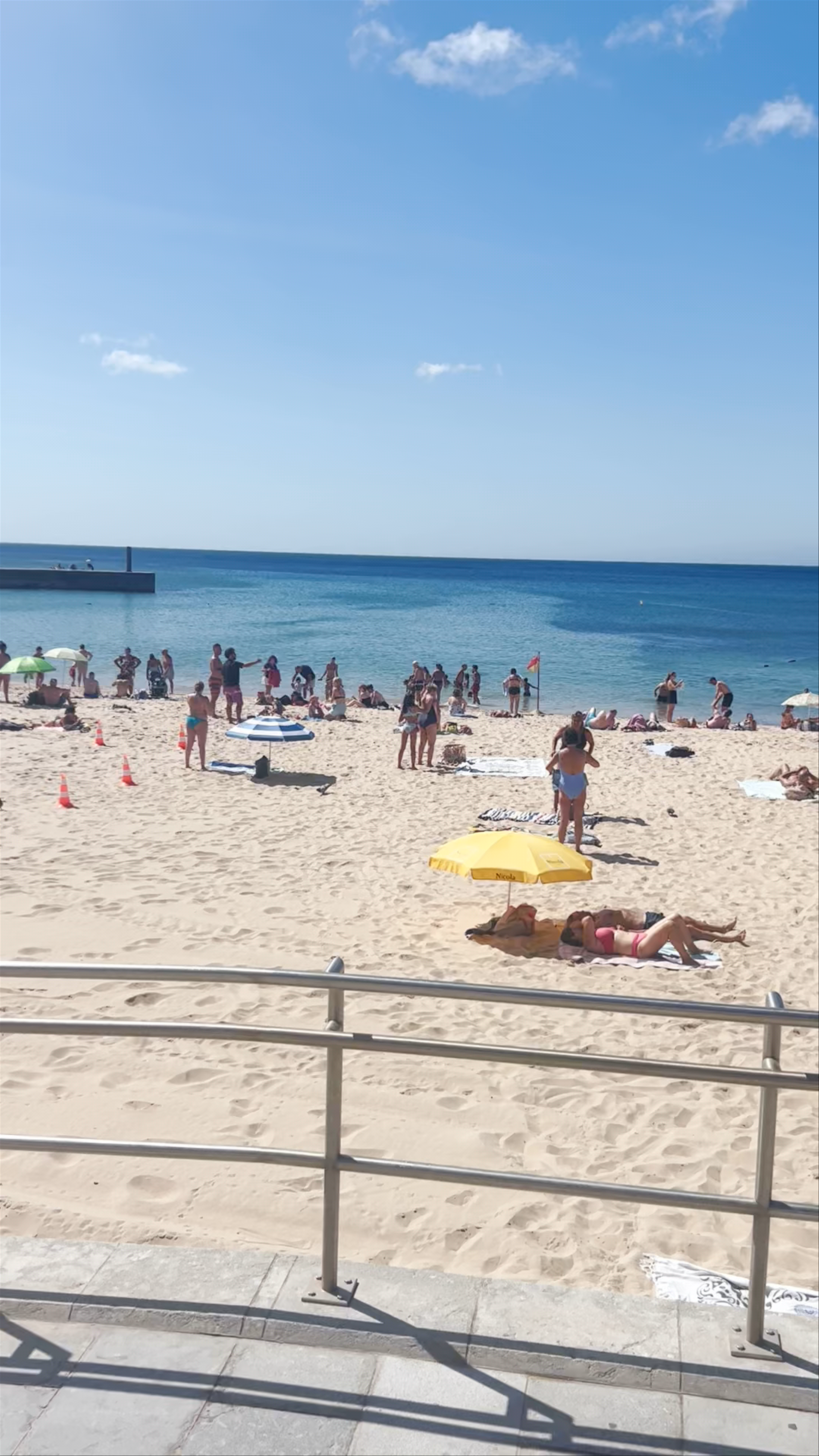 Sunny Beach Day at Praia do Tamariz, Portugal