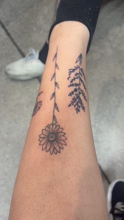 Fifth Estate Tattoo - Lower leg flower piece - Tattoo Near Me - Gilbert, Arizona