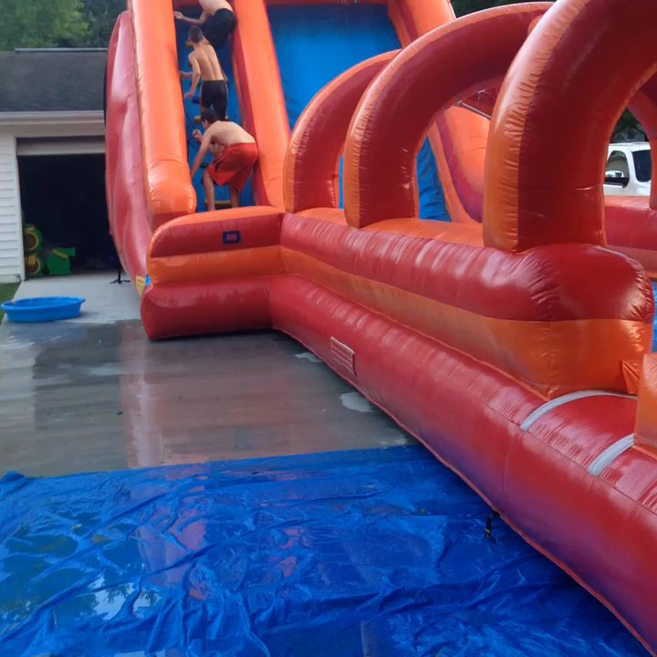 Bouncers R Us - Slip N Dip red & orange $375 weekend rental - Bounce House Rentals Near Me - Picayune, Mississippi