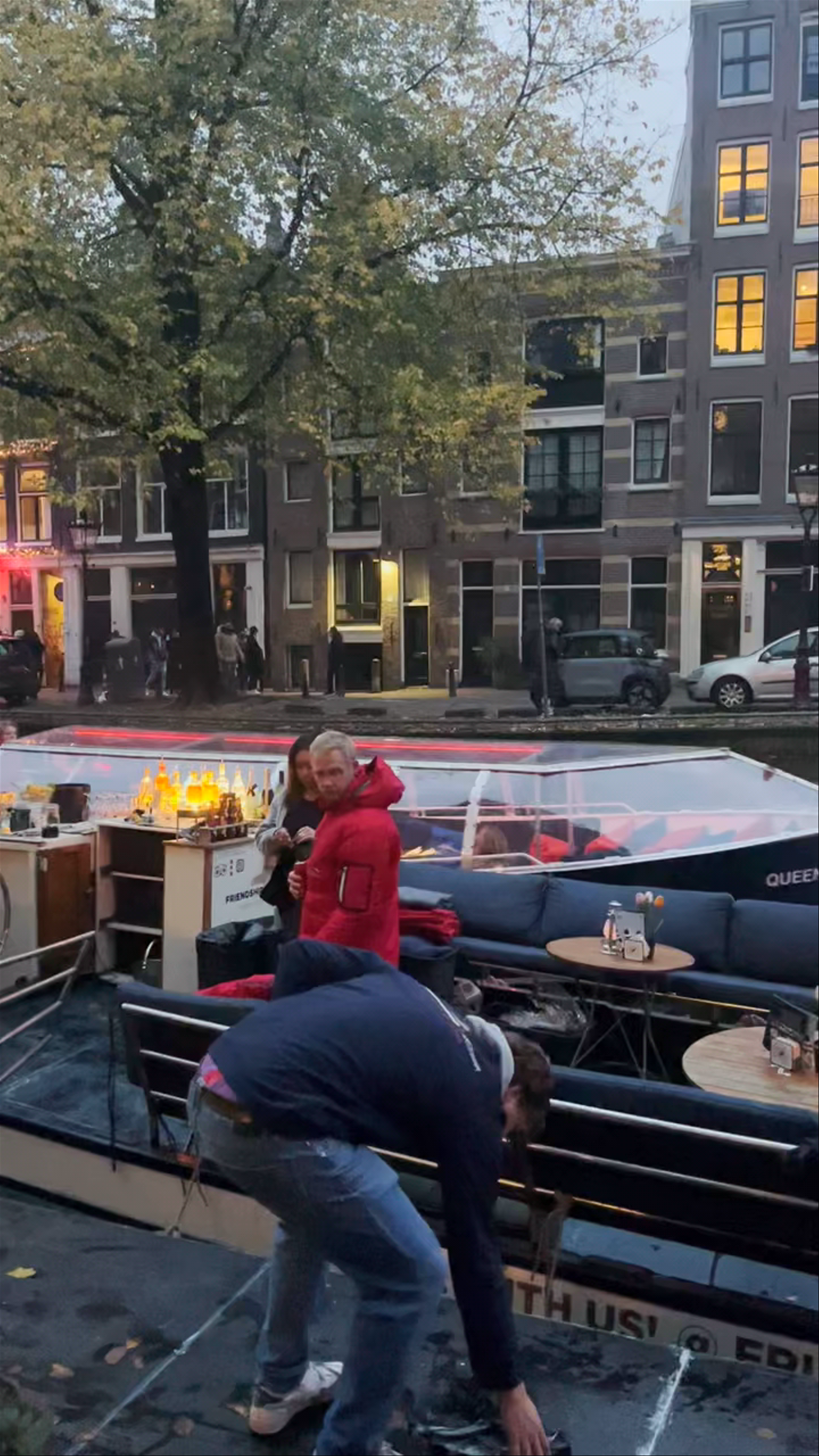 Evening Canal Cruise Ambiance in Amsterdam