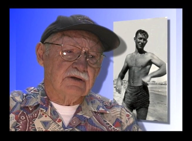 An elderly man shares historical reflections on his youth as a surfer, illustrated with black-and-white archival footage of himself and his peers on the beach.