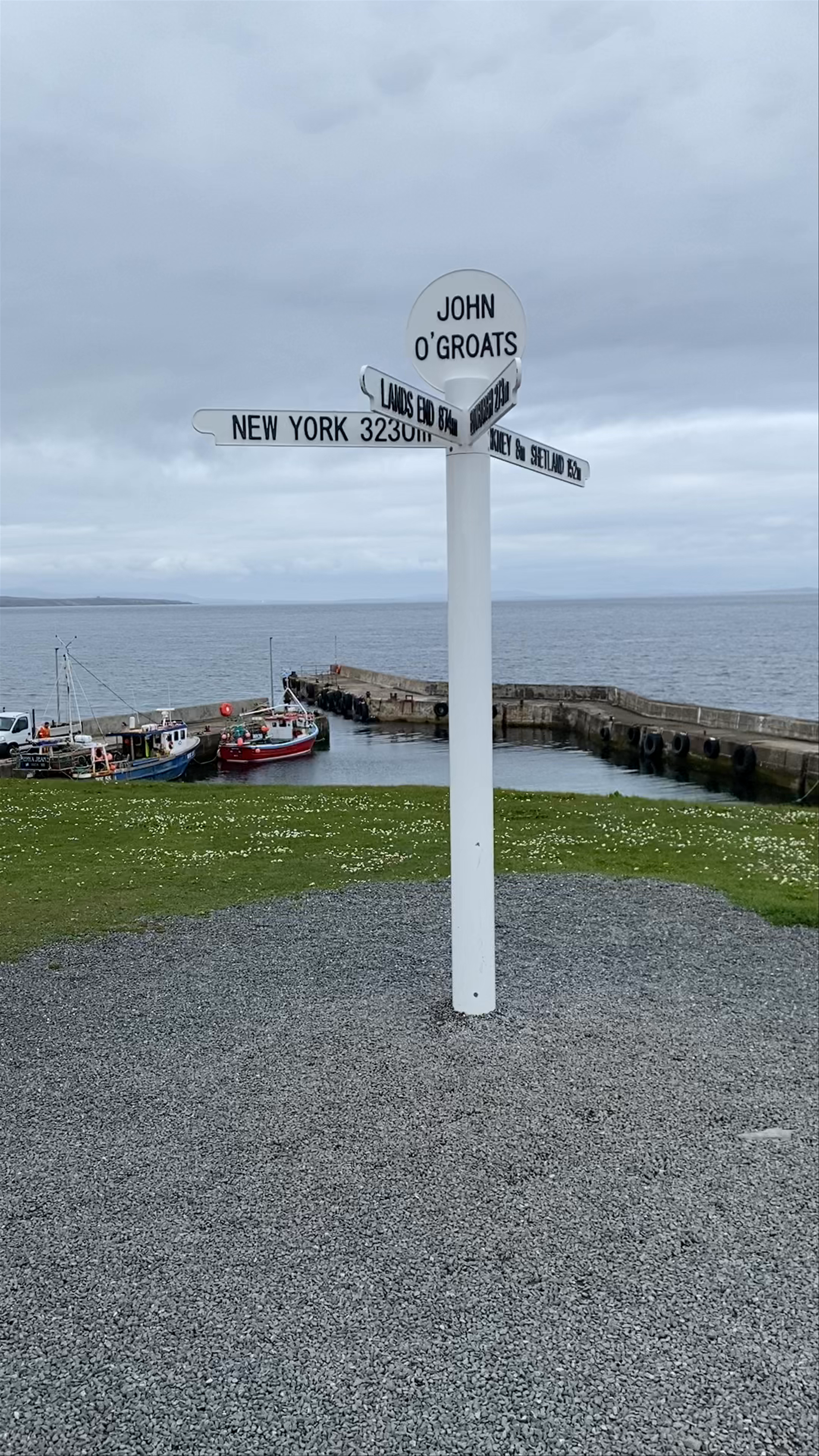 John O'Groats Signpost: Iconic Northern Scotland Coastal Landmark