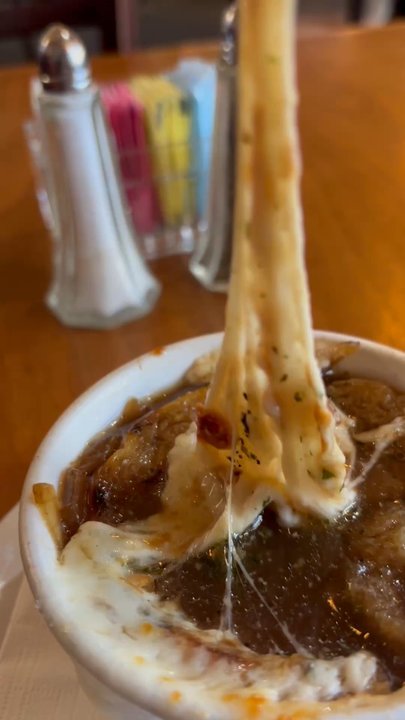 Brick's - Look at that gorgeous cheese stretch on the French onion soup. - New American Near Me - Placerville, California