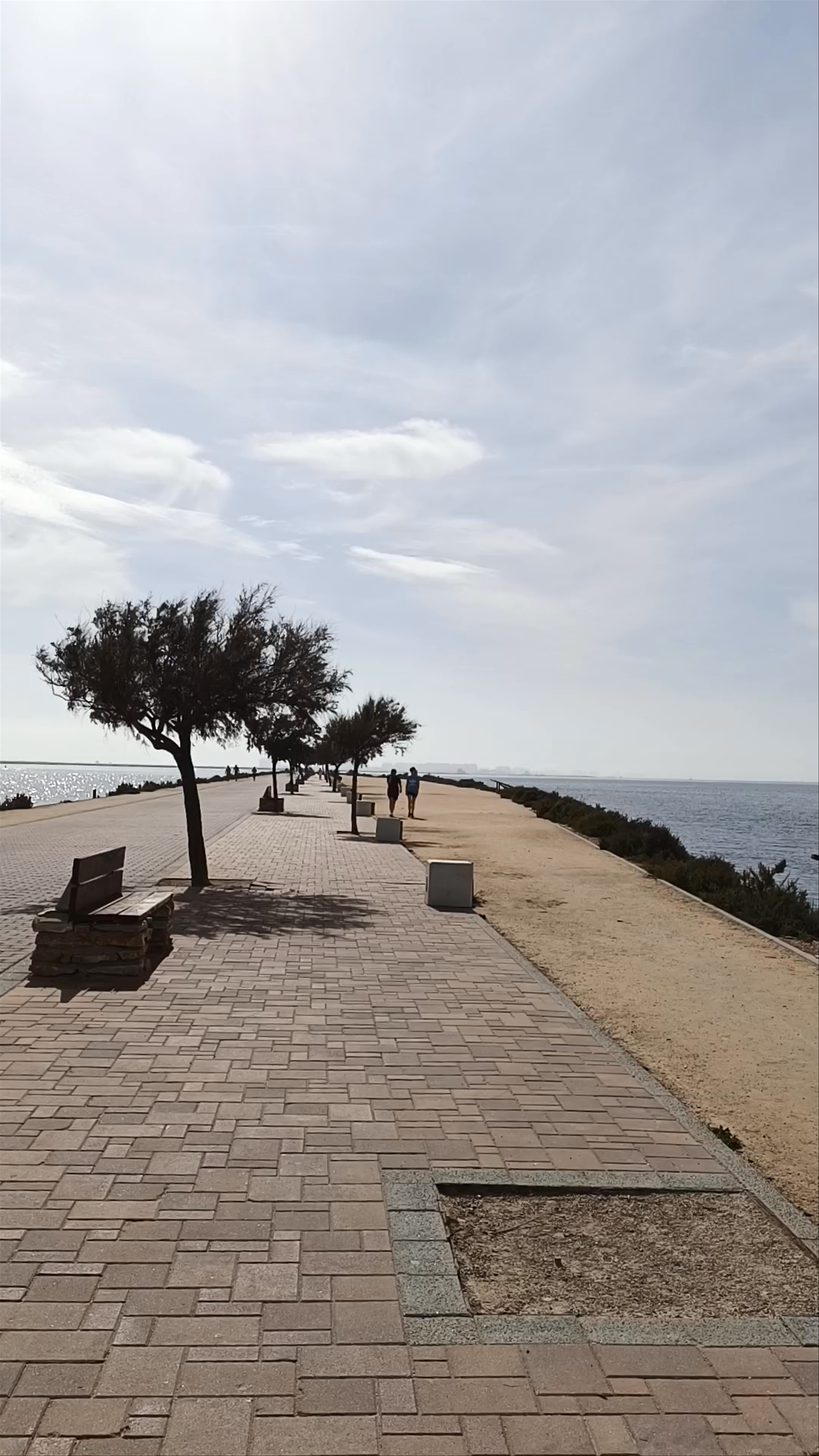 Serene Coastal Walk at Playa de la Rota, Spain